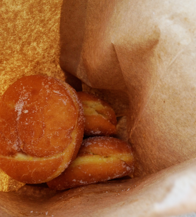 Donuts in a brown paper bag