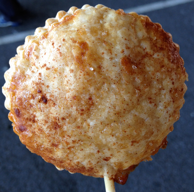 a mini apple pie on a stick from Pie Corps