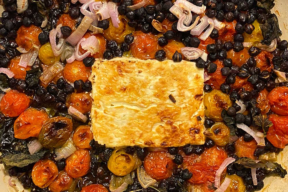 Baked feta with black chickpeas