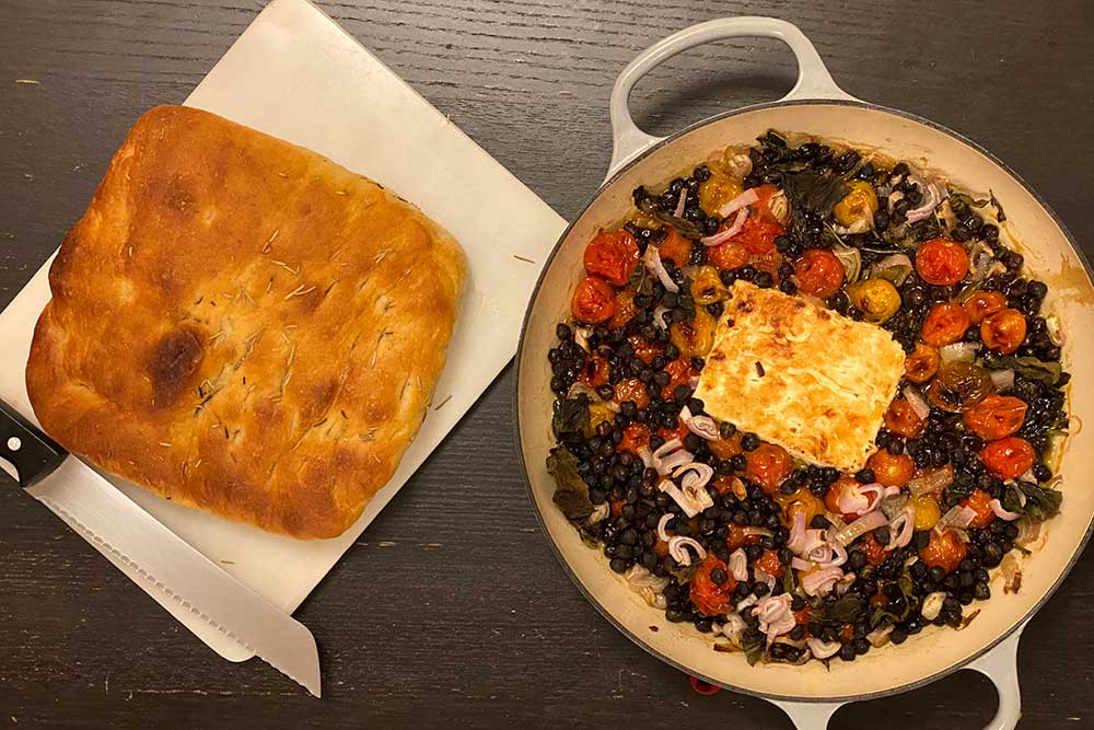 baked feta with black chickpeas and a nice loaf of bread that soaked up the oil