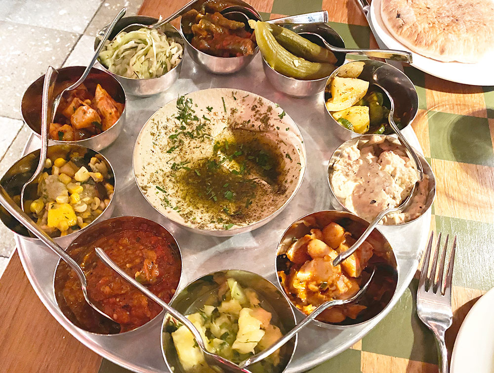 the salatim mezze plate from Laser wolf includes 10 salads and hummus