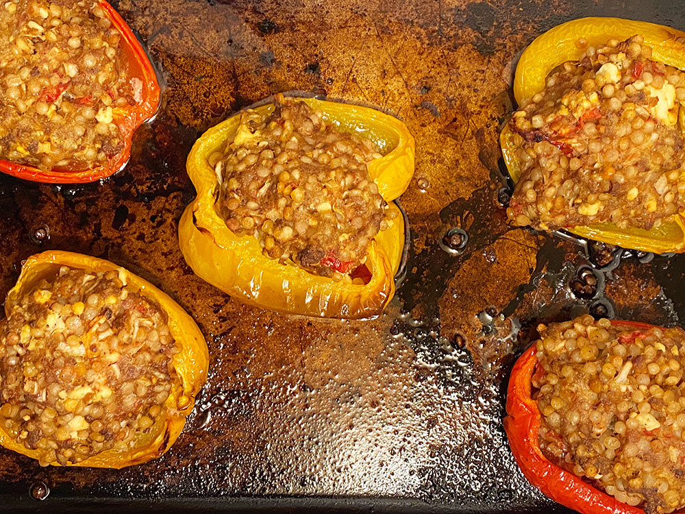 Stuffed peppers filled with lamb coming out of the oven