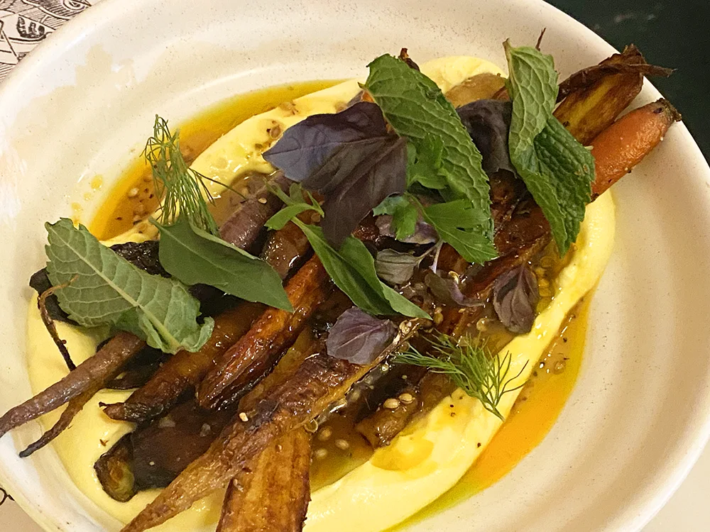 Roasted carrots over yogurt