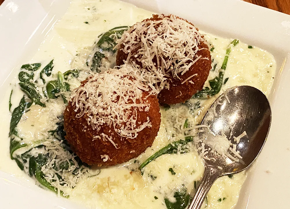 Arancini at Montano's restaurant in North Truro on Cape Cod with cream sauce