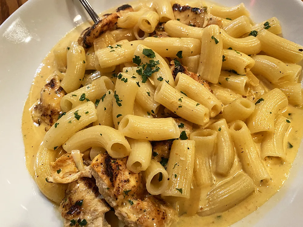 Jerk Chicken with rigatoni and cream sauce