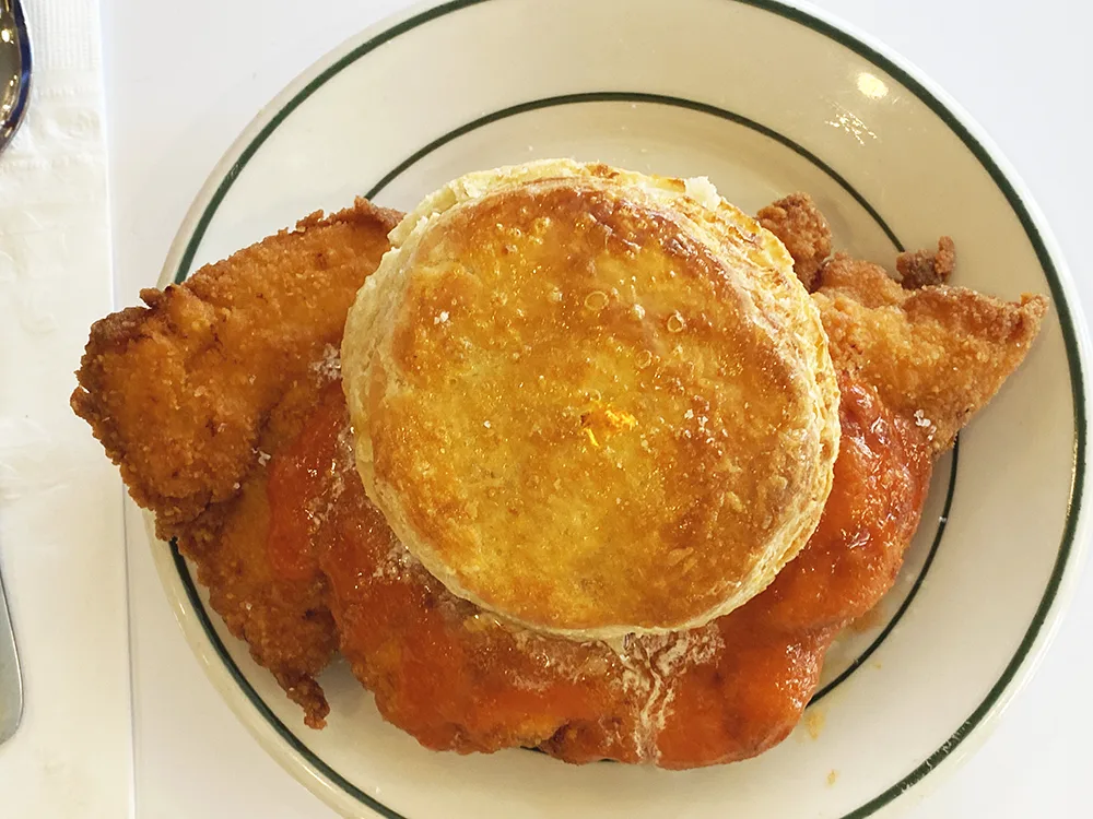 The Chicken biscuit at Pies -n- thighs has hot sauce and butter and is flaky